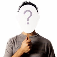 man holding question mark sign over his face